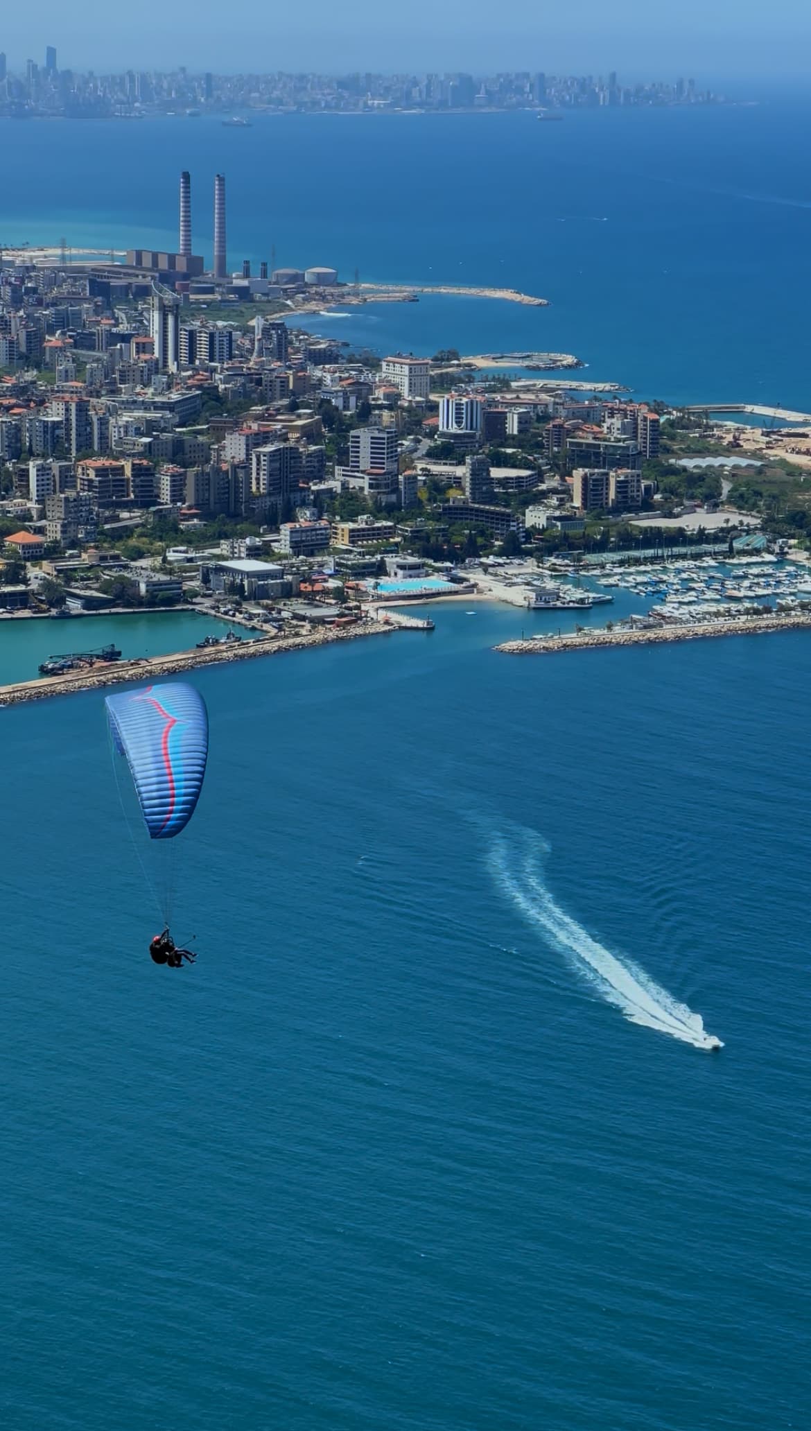 Tandem passengers flying the Jounieh coast